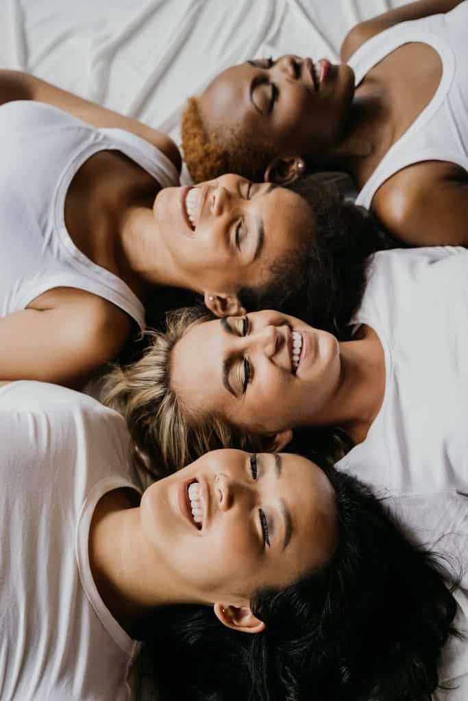 Beautiful Smiling Women Lying Down